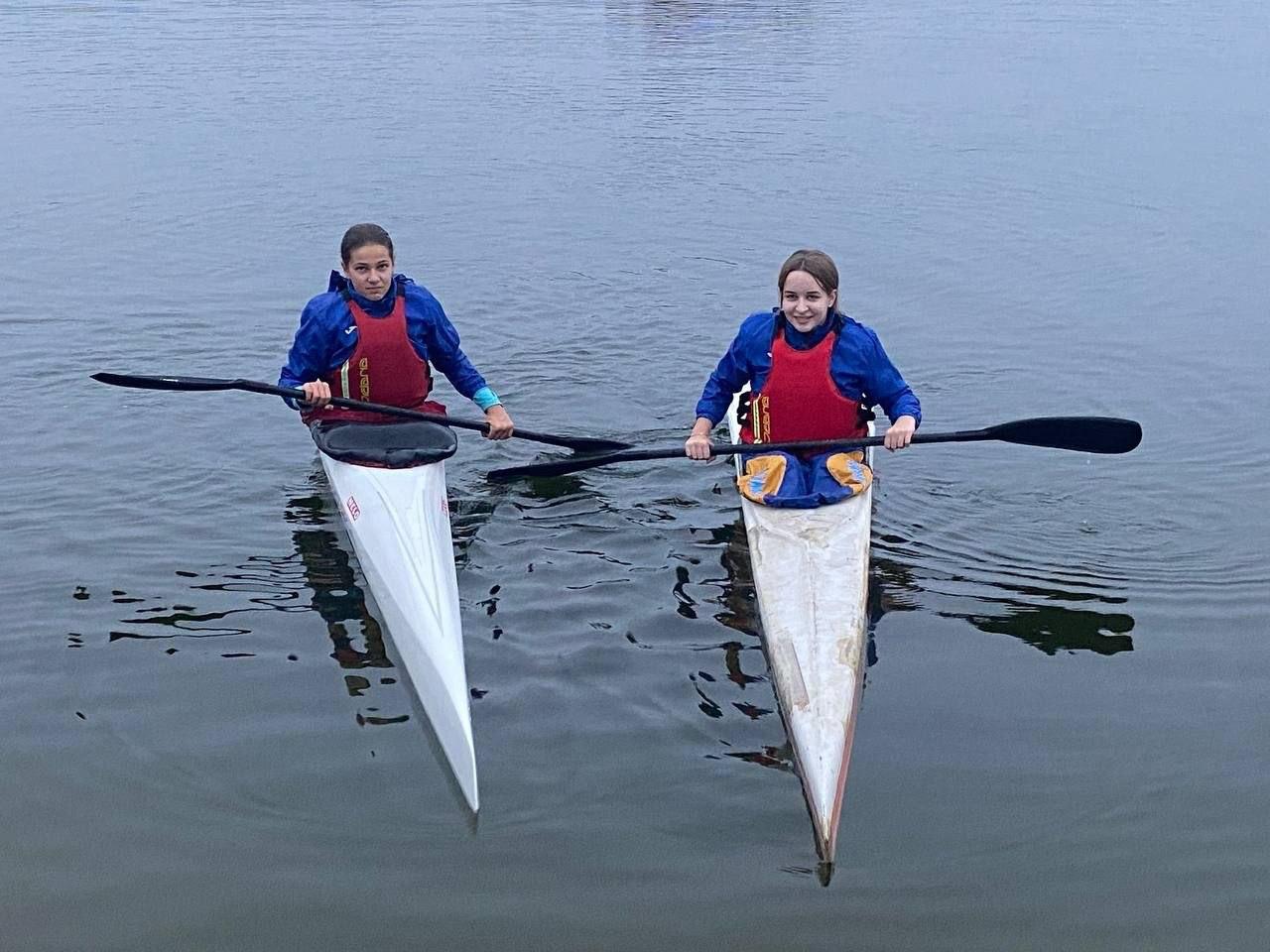 Two girls in kayaks